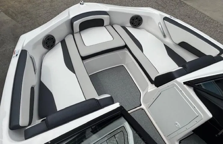 Slide: The Image of 2022 Yamaha Boats AR195 interior with sleek seating and modern design. - 11
