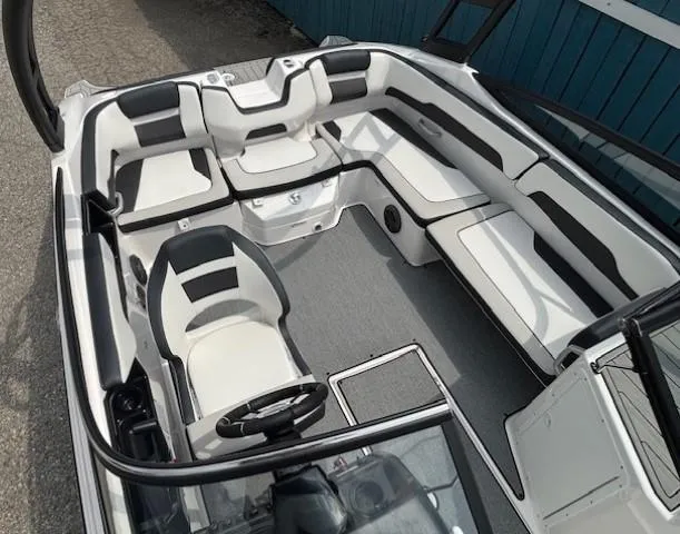 Slide: The Image of 2022 Yamaha Boats AR195 interior with sleek seating and modern design. - 25