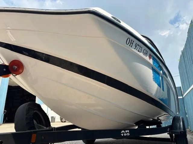 Slide: The Image of 2022 Yamaha AR195 boat on trailer, close-up view from below. - 3