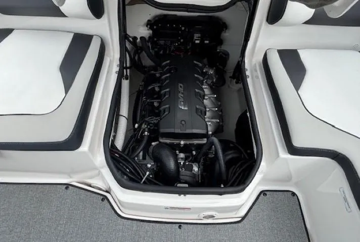 Slide: The Image of 2022 Yamaha AR195 boat engine compartment with open hatch, showcasing the engine layout. - 31