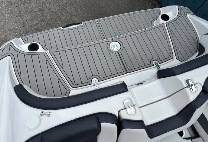 Slide: The Image of 2022 Yamaha AR195 boat deck with sleek gray and black design. - 32