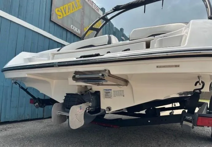 Slide: The Image of 2022 Yamaha Boats AR195, rear view, showcasing sleek design and powerful engine. - 6