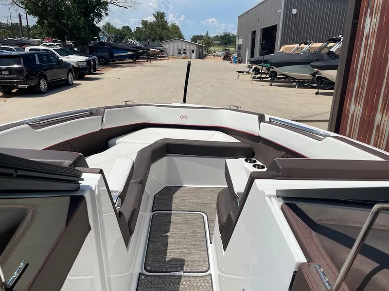 Slide: The Image of 2023 Cobalt R8 Surf boat interior with sleek seating and modern design. - 11