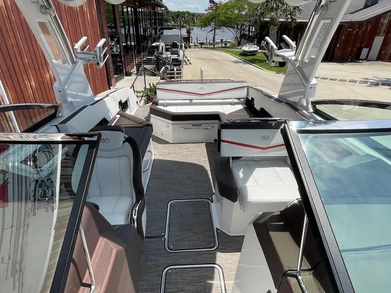 Slide: The Image of 2023 Cobalt R8 Surf boat interior with luxurious seating and modern design. - 15