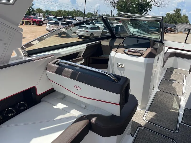 Slide: The Image of 2023 Cobalt R8 Surf boat interior with sleek seating and modern dashboard design. - 7