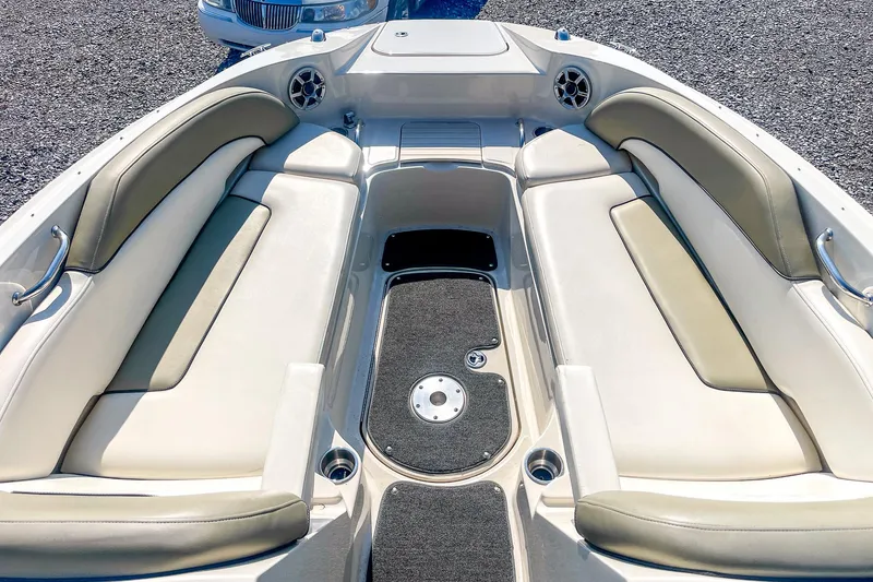 Slide: The Image of 2007 Sea Ray 260 Sundeck interior with spacious seating and sleek design. - 16