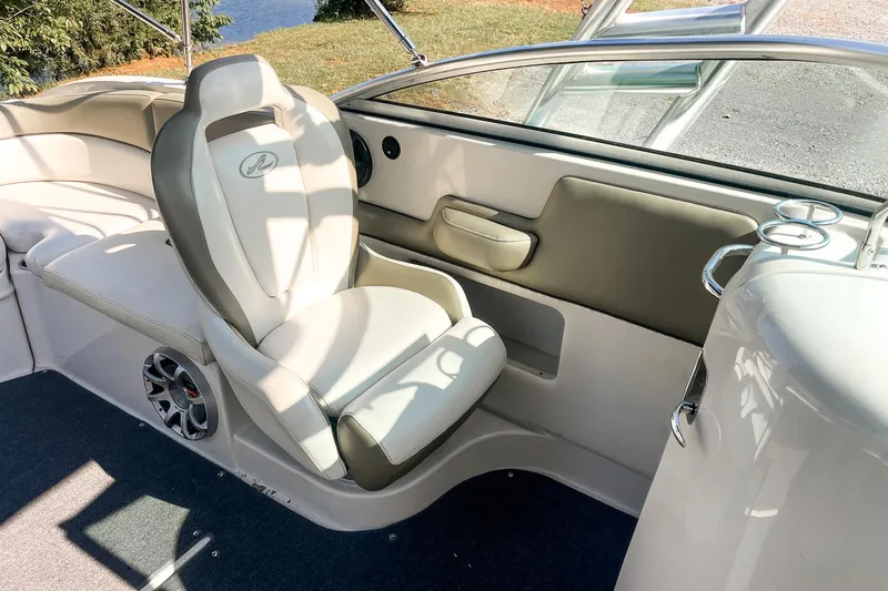 Slide: The Image of 2007 Sea Ray 260 Sundeck interior with plush seating and modern design. - 20