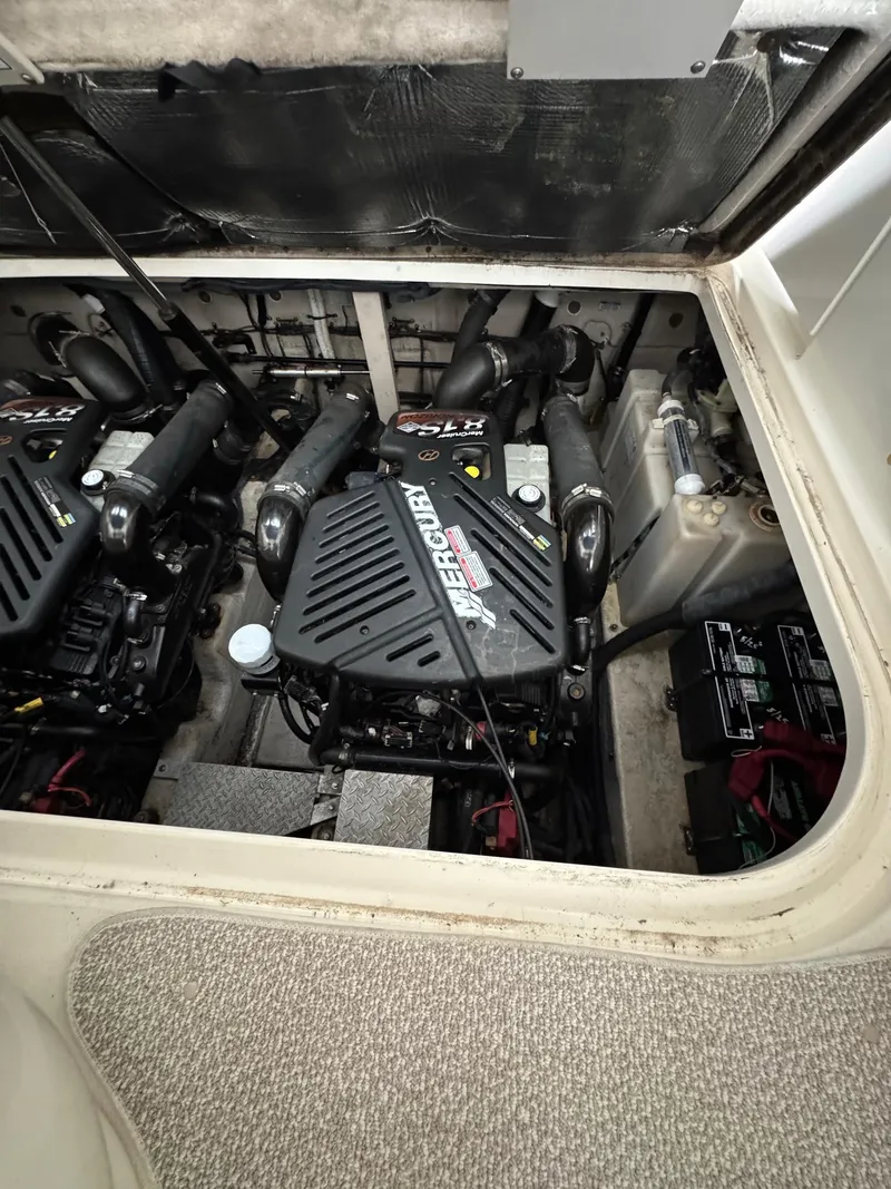 Slide: The Image of Engine compartment of a 2010 Sea Ray 360DA with twin Mercury engines. - 28