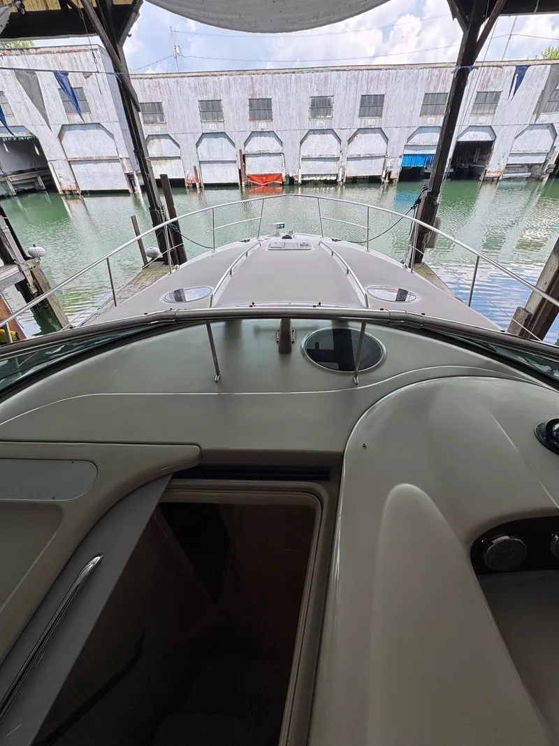 Slide: The Image of 2010 Sea Ray 360DA yacht docked in marina, view from helm. - 4