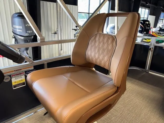 Slide: The Image of Luxurious tan seat on 2025 Tahoe Pontoon SP 2180 CR boat, featuring Yamaha 150 engine. - 20
