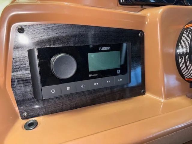 Slide: The Image of Dashboard of 2025 Tahoe Pontoon SP 2180 CR with Fusion Bluetooth stereo system. - 24