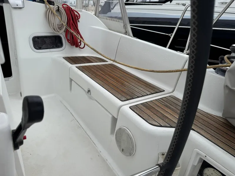 Slide: The Image of Cockpit of 2014 Beneteau 37 sailboat with wooden seating  - 12