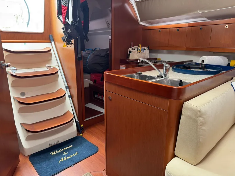 Slide: The Image of Interior of 2014 Beneteau 37 sailboat with galley and stairs. - 20