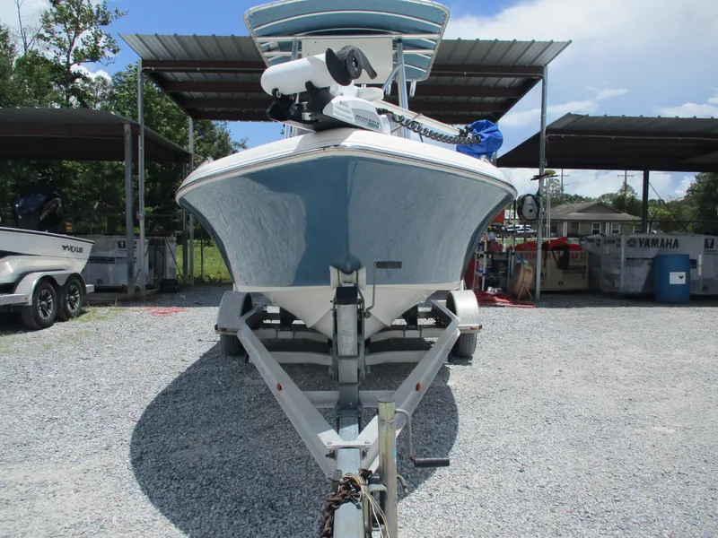 Slide: The Image of 2008 Key West 186 Sportsmen boat on trailer, parked outdoors under a clear sky. - 2
