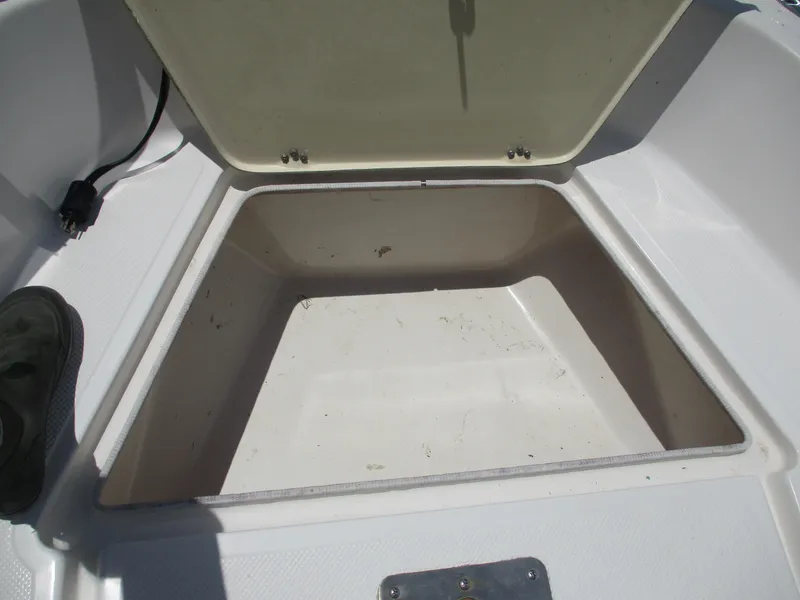 Slide: The Image of Open storage compartment on a 2008 Key West 186 Sportsmen boat. - 7
