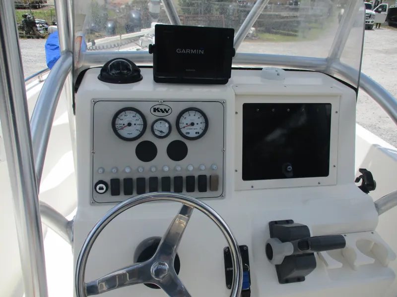Slide: The Image of 2008 Key West 186 Sportsmen boat dashboard with Garmin GPS and control panel. - 9