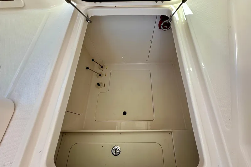 Slide: The Image of Storage compartment of 2026 Grady-White Freedom 345 boat, featuring clean, spacious interior. - 49