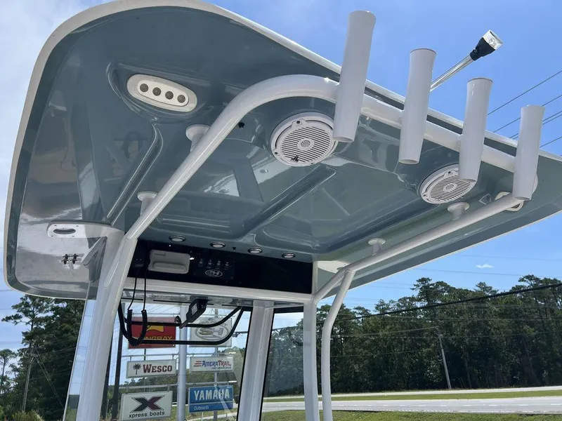 Slide: The Image of 2020 Sea Hunt Ultra 275 SE boat roof with rod holders and speakers. - 22