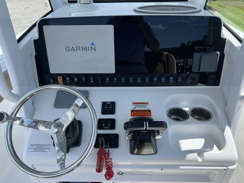 Slide: The Image of Control panel of 2020 Sea Hunt Ultra 275 SE boat with Garmin navigation system. - 9
