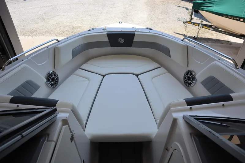 Slide: The Image of 2023 Chaparral 23 Surf boat interior with spacious seating and modern design. - 3