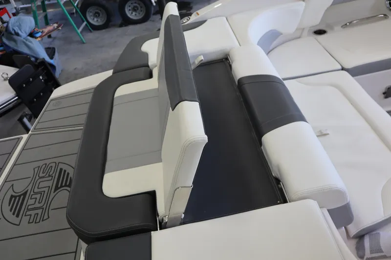 Slide: The Image of 2023 Chaparral 23 Surf boat interior with adjustable seating and stylish upholstery. - 30