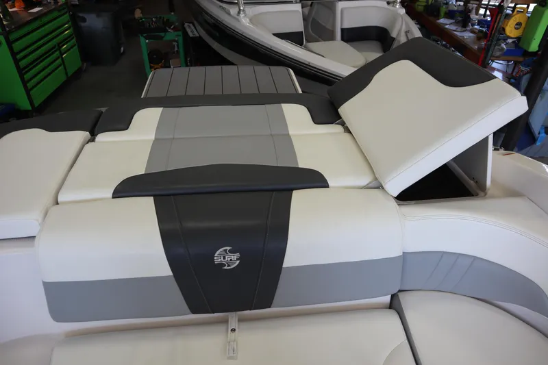 Slide: The Image of 2023 Chaparral 23 Surf boat interior with adjustable seating and sleek design. - 33