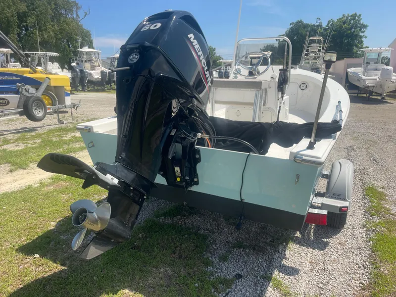 Slide: The Image of 2023 Intruder ISLAND CLASSIC 17 boat with Mercury outboard motor on trailer. - 10