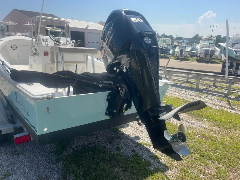 Slide: The Image of 2023 Intruder ISLAND CLASSIC 17 boat with Mercury 60 outboard motor on trailer. - 11