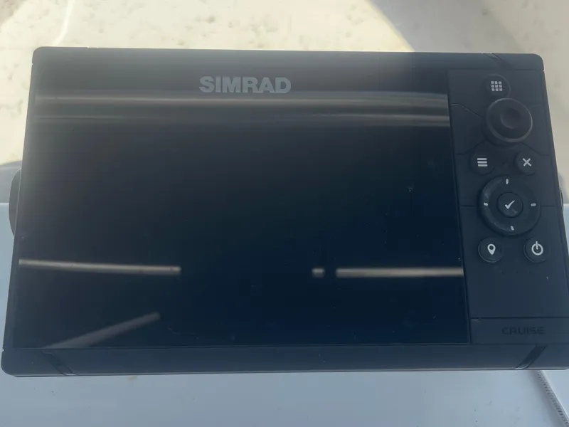 Slide: The Image of Simrad Cruise display on 2023 Intruder ISLAND CLASSIC 17 boat dashboard. - 21