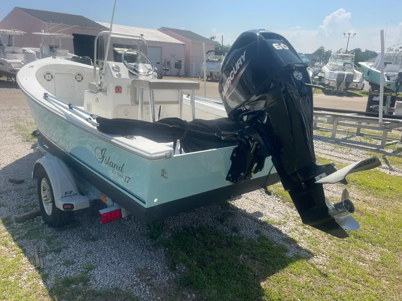 Slide: The Image of 2023 Intruder Island Classic 17 boat with Mercury 60 engine on trailer. - 8