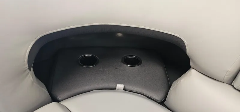 Slide: The Image of Sun Tracker PB-20 2026 boat seat with dual cup holders, gray upholstery. - 14