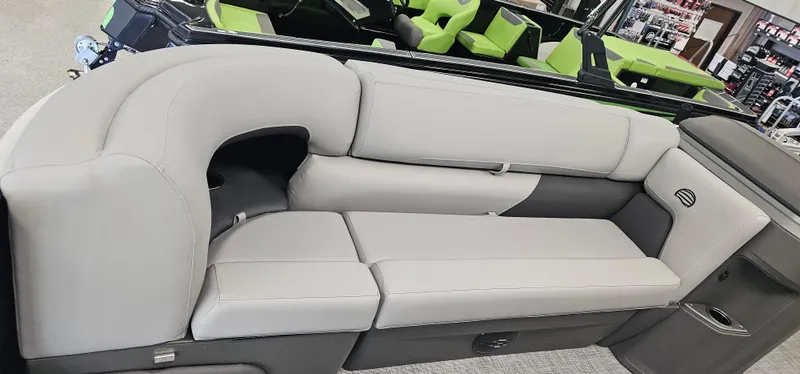 Slide: The Image of 2026 Sun Tracker PB-20 boat interior with gray cushioned seating. - 6