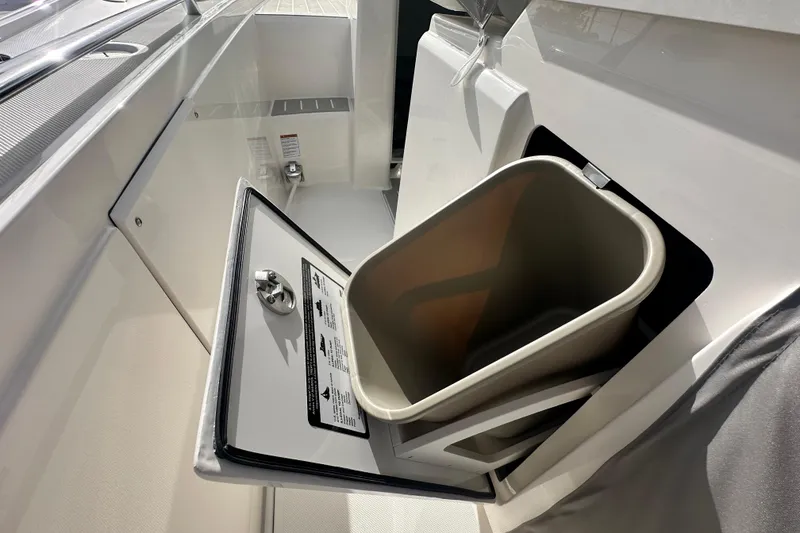 Slide: The Image of Built-in trash bin on 2026 Tiara Yachts 34 LS, showcasing sleek design and functionality. - 35