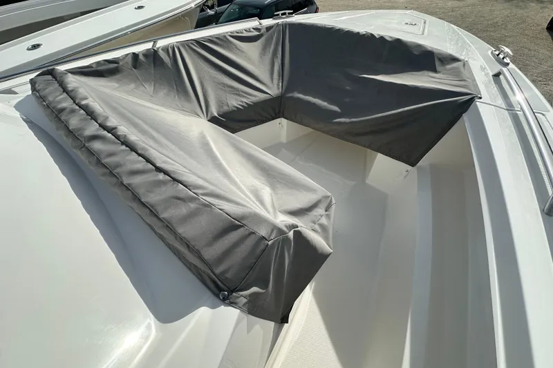 Slide: The Image of 2026 Tiara Yachts 34 LS boat with covered seating area, showcasing luxury design. - 36