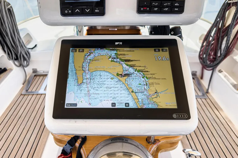 Slide: The Image of Navigation display on a 2001 Hylas 49 yacht, showing nautical chart and depth. - 16