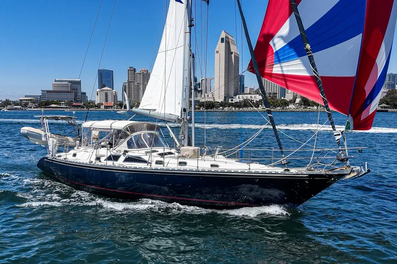 Slide: The Image of Sailing yacht Hylas 49 (2001) cruising near city skyline on a sunny day. - 3