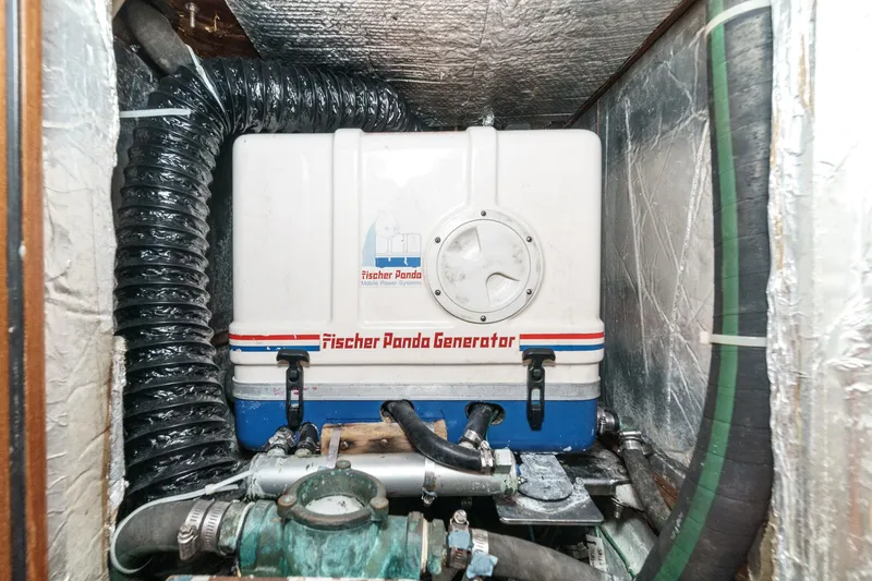 Slide: The Image of Fischer Panda generator in a 2001 Hylas 49 yacht engine room. - 38