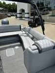 Slide: The Image of 2025 Bennington 25 QSBA pontoon boat with spacious seating and modern design. - 8