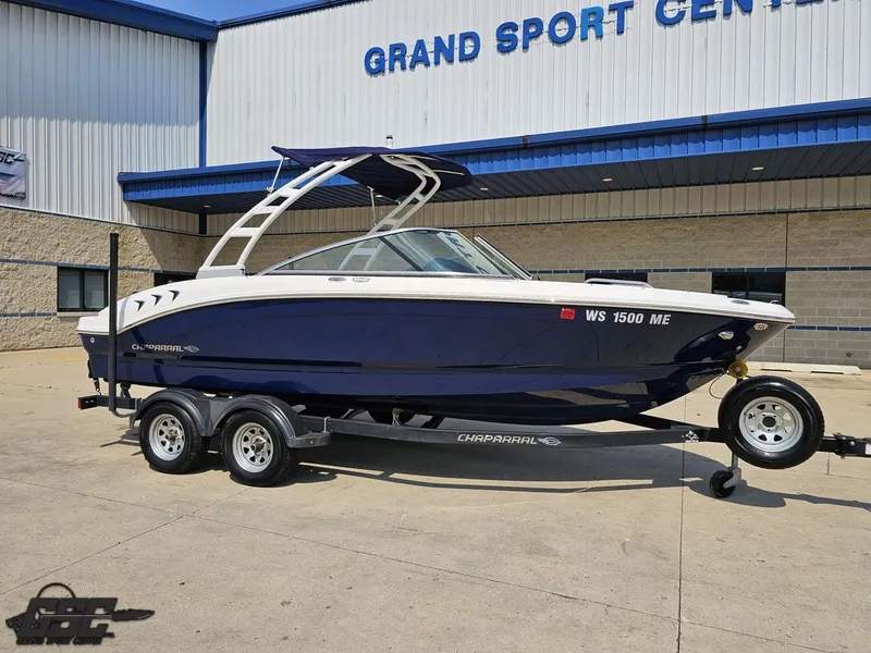Slide: The Image of 2022 Chaparral 21 SSi boat on trailer at Grand Sport Center. - 12