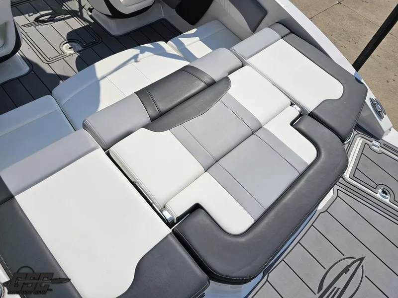 Slide: The Image of 2022 Chaparral 21 SSi boat interior with stylish gray and white seating. - 45