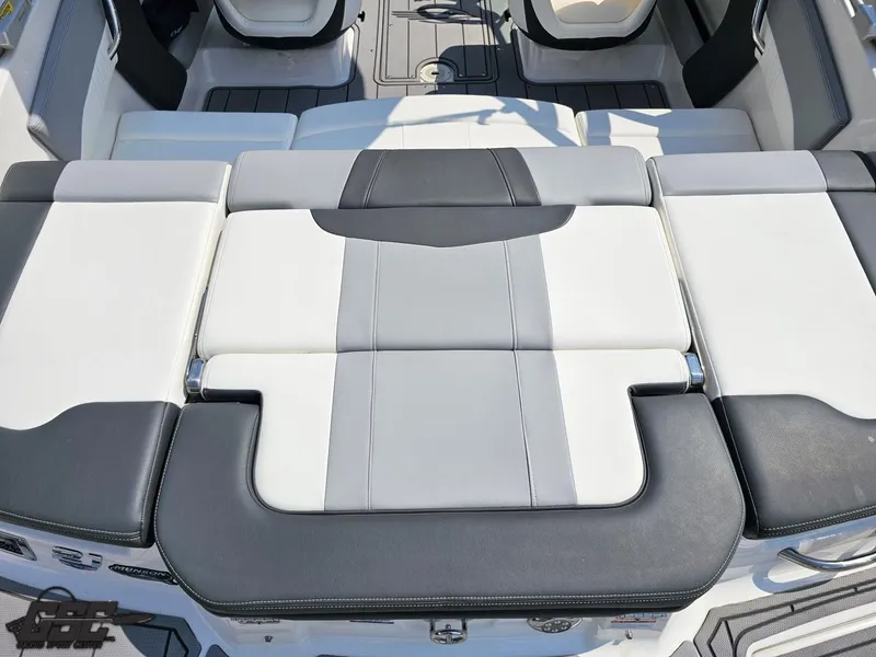 Slide: The Image of 2022 Chaparral 21 SSi boat interior with sleek, modern seating design. - 49