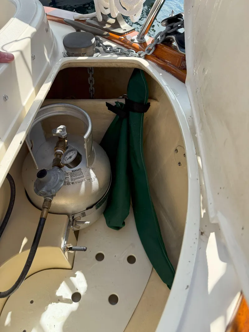 Slide: The Image of Storage compartment on a 1993 Pacific Seacraft Crealock 34 sailboat with propane tank. - 17