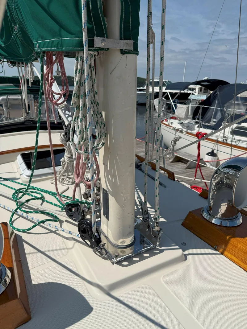 Slide: The Image of Sailboat deck of 1993 Pacific Seacraft Crealock 34 with rigging and green sail cover. - 29