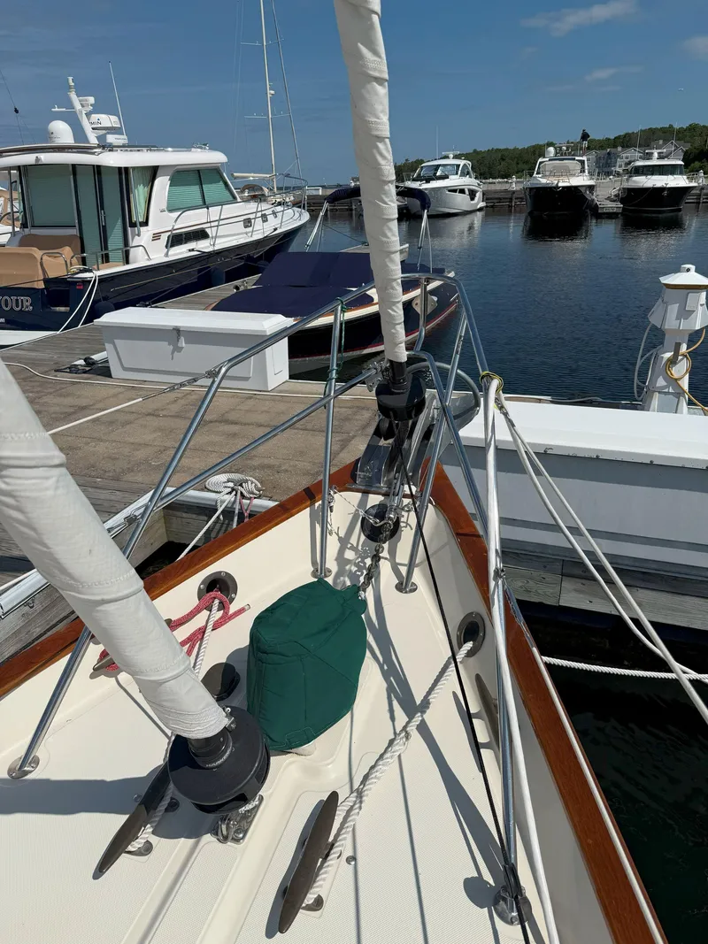 Slide: The Image of Sailboat docked at marina, Pacific Seacraft Crealock 34, 1993 model, clear sky. - 32