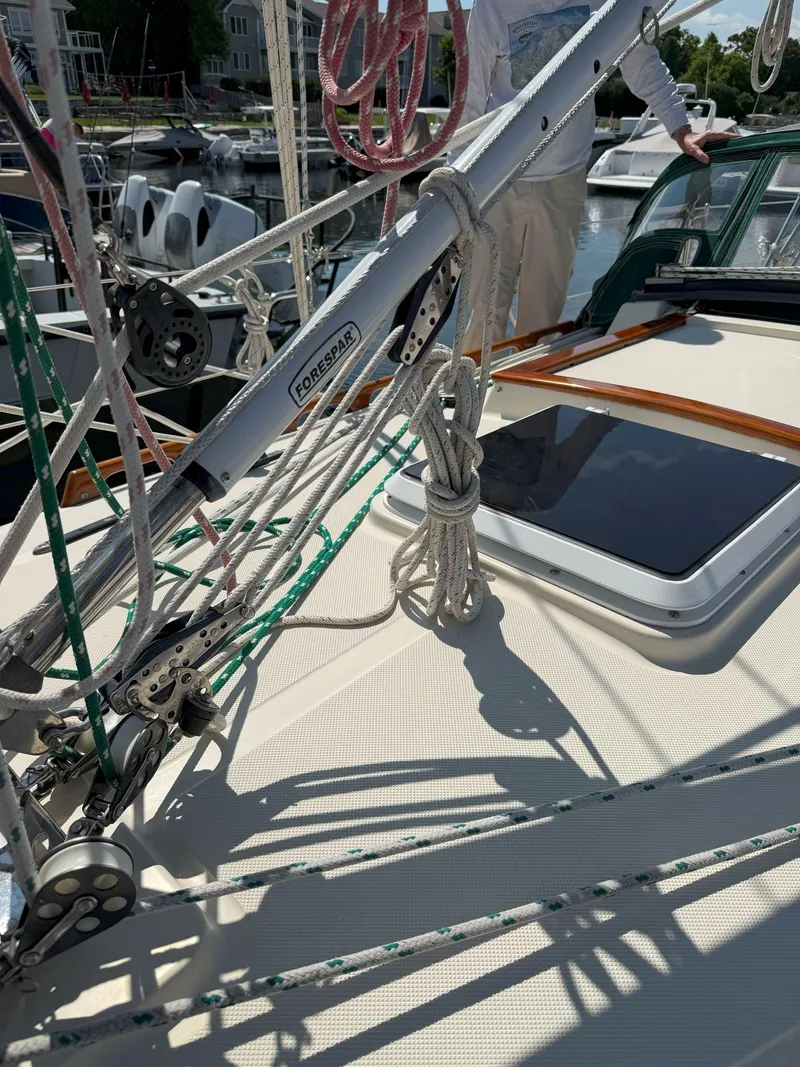 Slide: The Image of Deck of 1993 Pacific Seacraft Crealock 34 sailboat with rigging and hatch. - 36