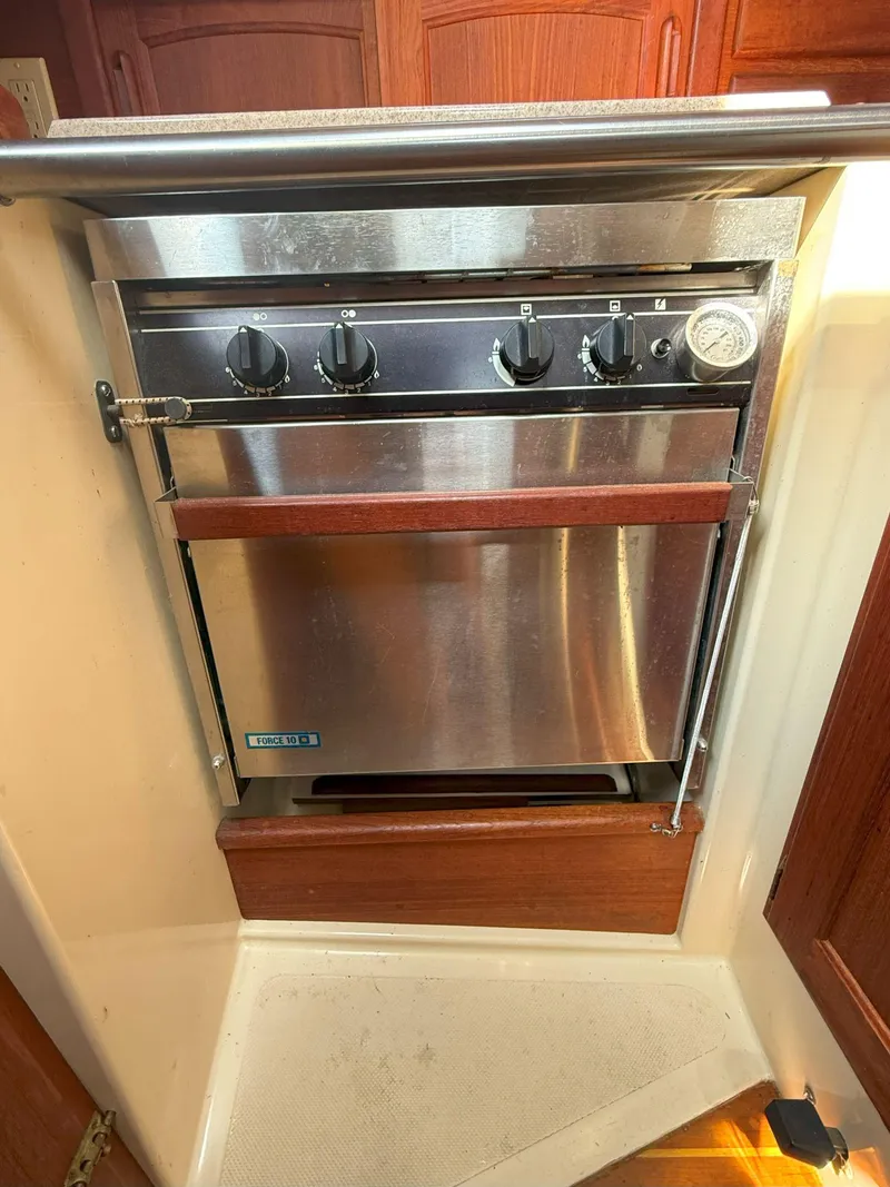 Slide: The Image of Stainless steel oven in 1993 Pacific Seacraft Crealock 34 yacht kitchen. - 41