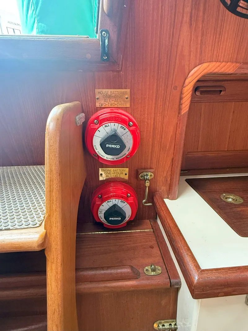 Slide: The Image of Battery switches on a 1993 Pacific Seacraft Crealock 34 sailboat interior. - 44