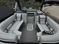 Slide: The Image of 2025 Bennington 25 QXSBA pontoon boat with luxurious seating and modern design. - 3