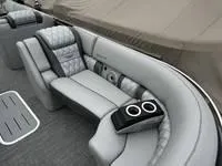 Slide: The Image of Luxurious seating on 2025 Bennington 25 QXSBA boat with cup holders and quilted upholstery. - 5