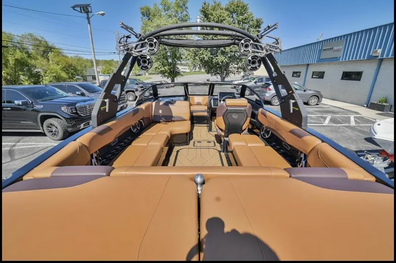 Slide: The Image of 2020 Malibu Wakesetter 23 LSV interior with tan seating and modern design. - 8